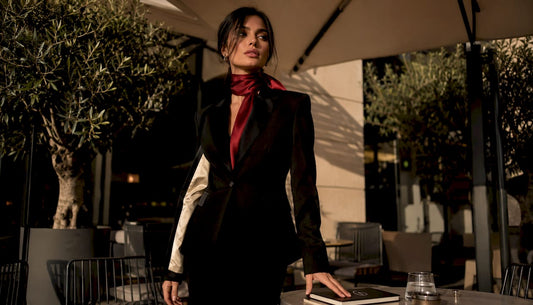Model showcasing luxury tailored fashion in Italian atelier